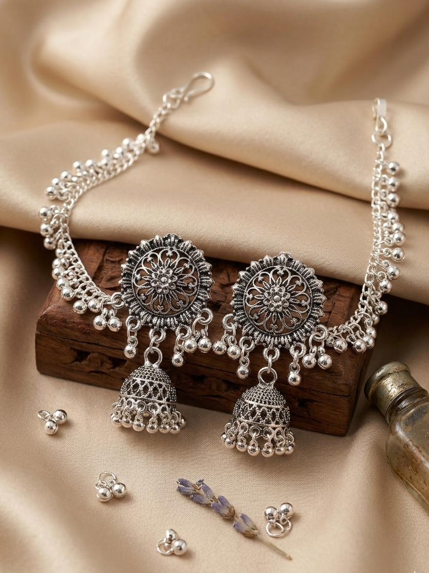 Oxidized Silver Temple Jhumka Earrings with Ruby Accents